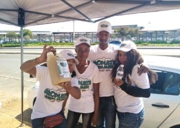 Thabang Tseko and Benny Mooka showing off their ginger beer