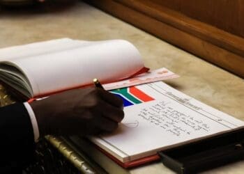 Deputy President Paul Mashatile signing cooperation agreements in New Delhi, India to boost trade and investment ties. Photo: Paul Mashatile’s FB