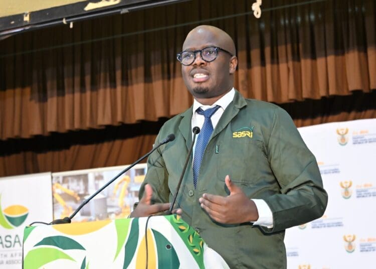 Deputy Minister of Trade, Industry and Competition Zuko Godlimpi addresses sugarcane growers during a dialogue in uMzinto, KwaZulu-Natal.